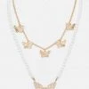 Vendor-unknown Capri Gold Multi Layer Pearl & Butterfly Embellished Necklace Set