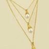 Vendor-unknown ACCESSORIES Kaya Golden Drop Pearl Layered Necklace